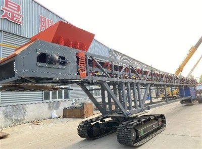 Transportador de stacker rastrejat